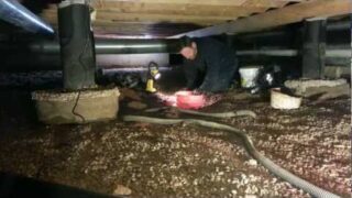Time lapse video of replacing a sump pump under a house